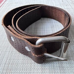 Brown leather belt with metal buckle